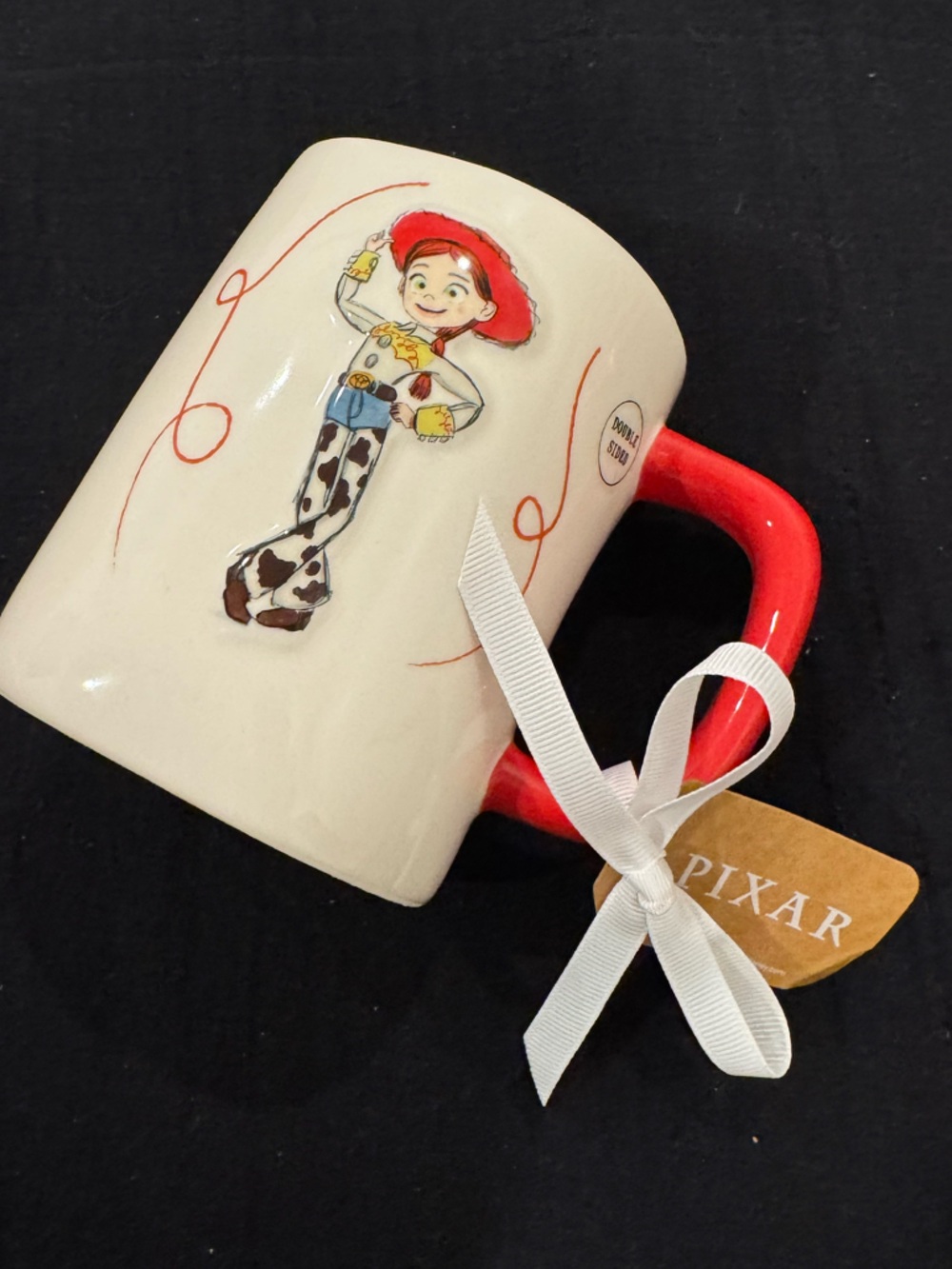 Disney Pixar X Rae Dunn collaCream Ceramic Mug with Red Handle and JESSIE 🤠